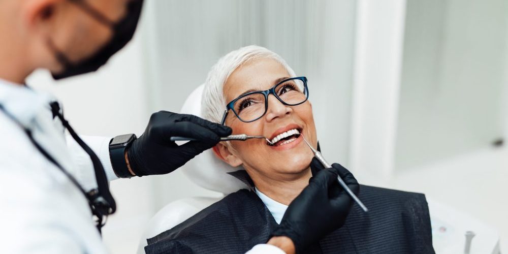 Beautiful,Senior,Woman,Having,Dental,Treatment,At,Dentist’s,Office.,Dentist restorative dentist auburn