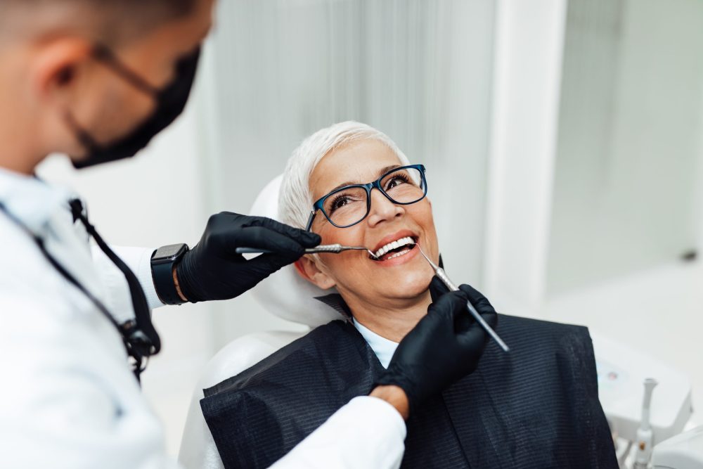 Beautiful,Senior,Woman,Having,Dental,Treatment,At,Dentist’s,Office.,Dentist restorative dentist auburn