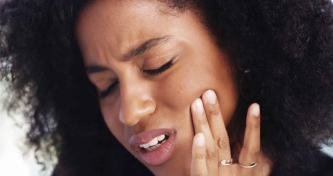 Toothache,,Sad,And,Face,Of,African,Woman,At,Home,For Emergency Dentist in Auburn