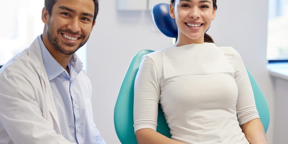 Portrait,,Dentist,And,Patient,In,Clinic,For,Consultation,,Oral,Hygiene Top Dentist in Auburn