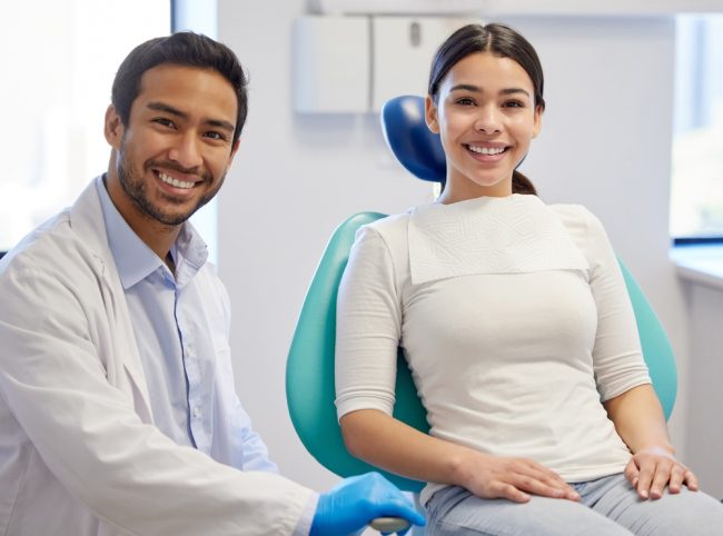 Portrait,,Dentist,And,Patient,In,Clinic,For,Consultation,,Oral,Hygiene Top Dentist in Auburn